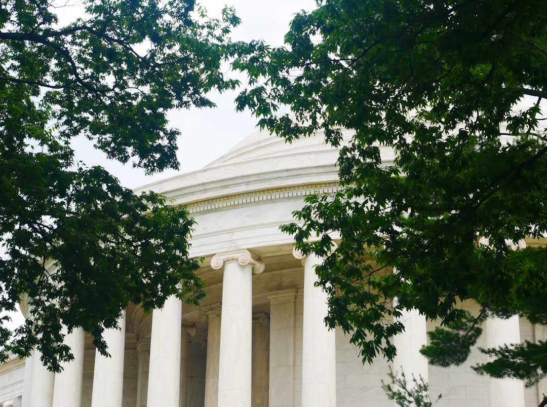 A neoclassical government building with tall columns, representing the public-sector agencies that can automate document intake and review with on-premises AI agents while keeping citizen data inside their own security boundary