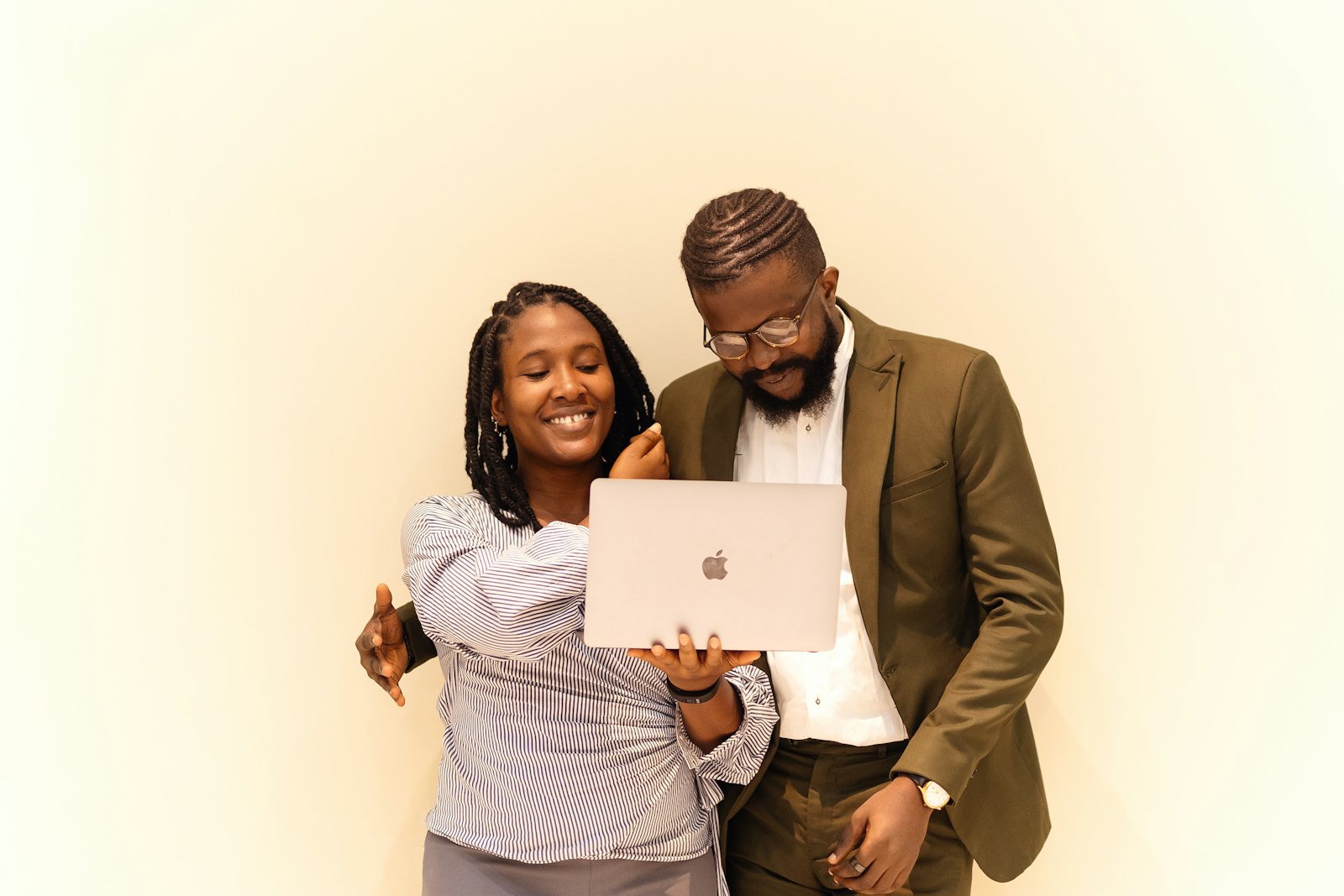 Two technology consultants collaborating, representing the partnership economics of delivering sovereign on-premises AI to regulated enterprise clients