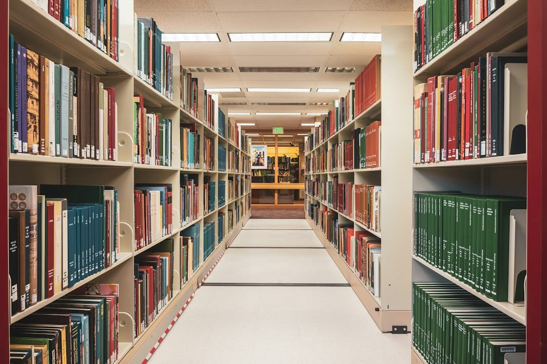A long aisle of library shelves, a reminder that a RAG framework is mostly about finding the right passage in a very large collection