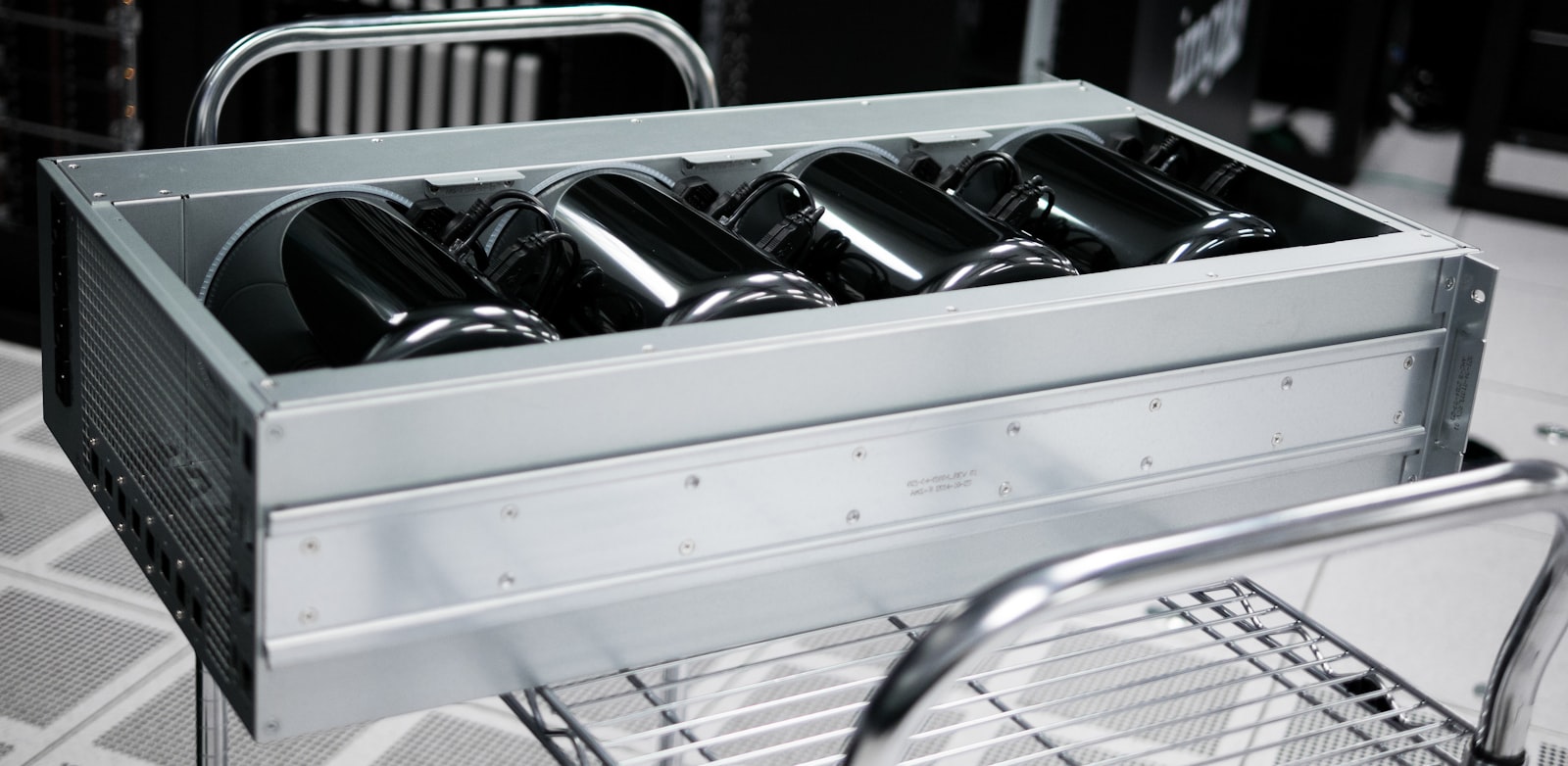 Racks of on-premises server hardware, representing the private enterprise infrastructure where a tool-using VDF AI agent runs, calls internal systems, and keeps every action inside the organization's own security boundary