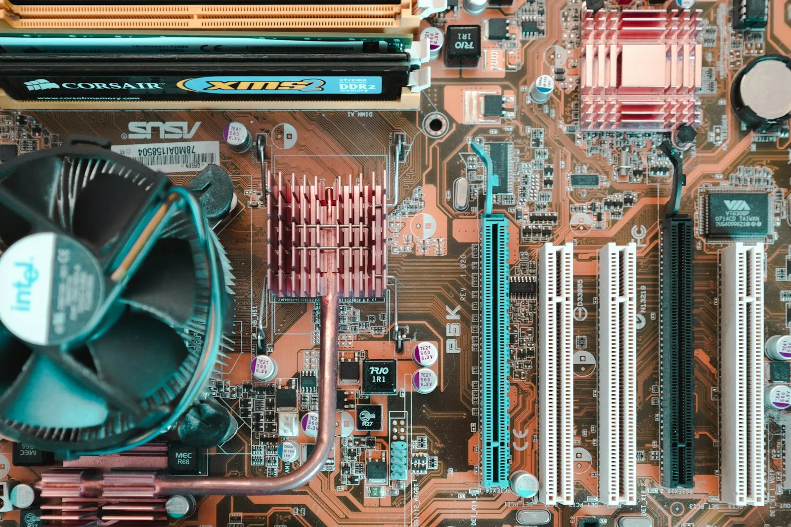 Close-up of a circuit board with integrated processors, the CPU and NPU hardware tier used for local AI inference inside regulated facilities
