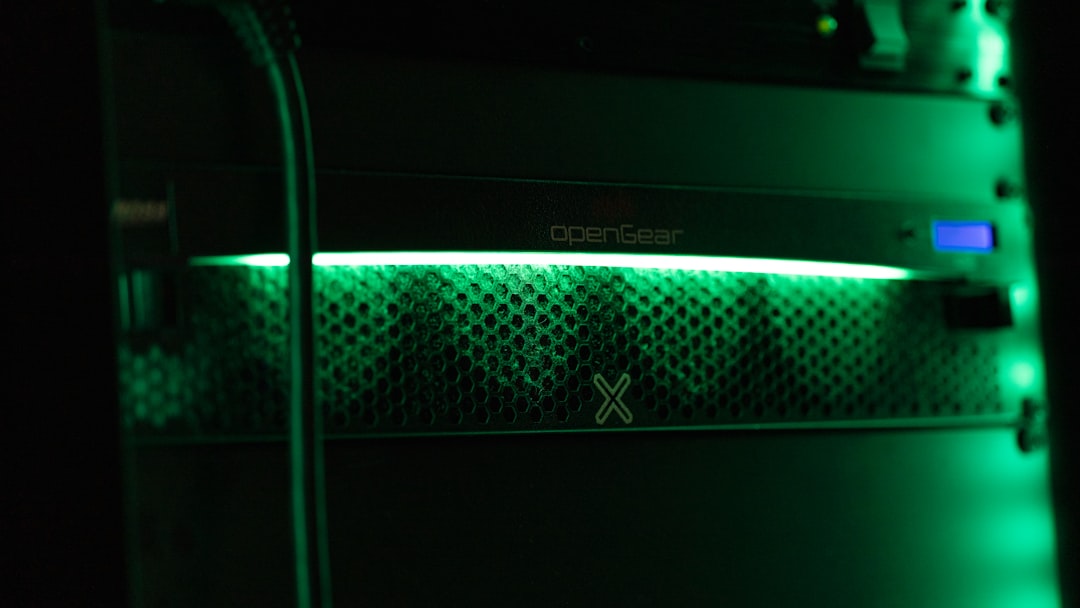 Close-up of status lights on a rack-mounted server, representing the on-premises systems of record that enterprise AI agents must integrate with inside the organisation's own security boundary