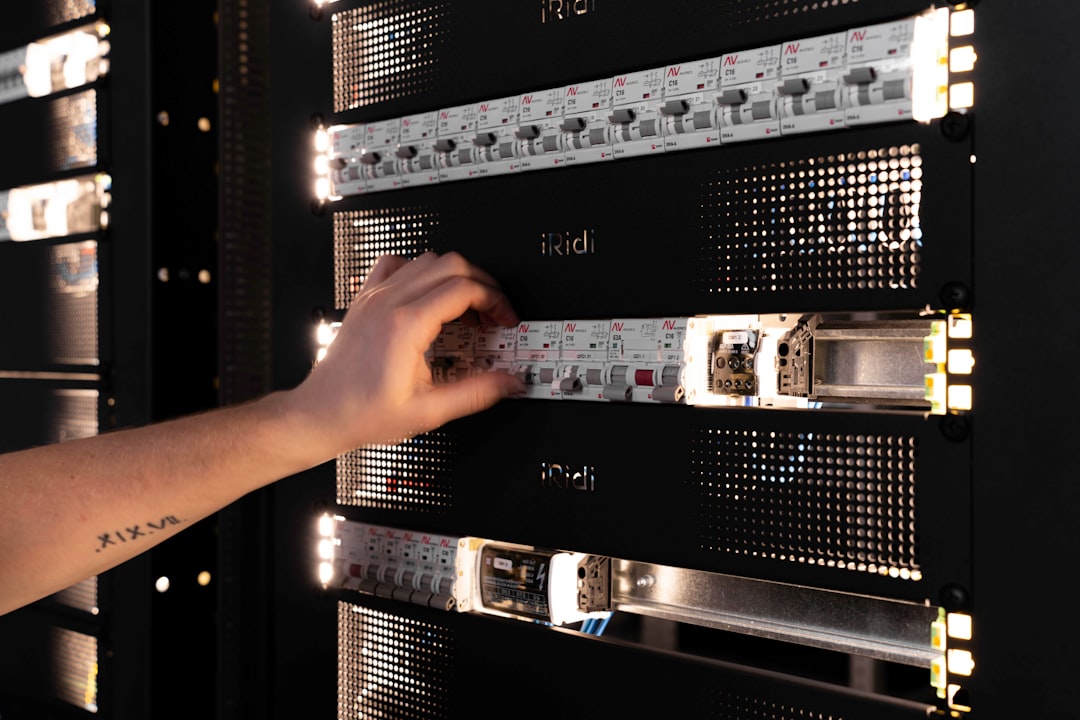 An engineer adjusting hardware components inside an illuminated server rack, representing the owned GPU infrastructure behind a sovereign on-premises AI platform