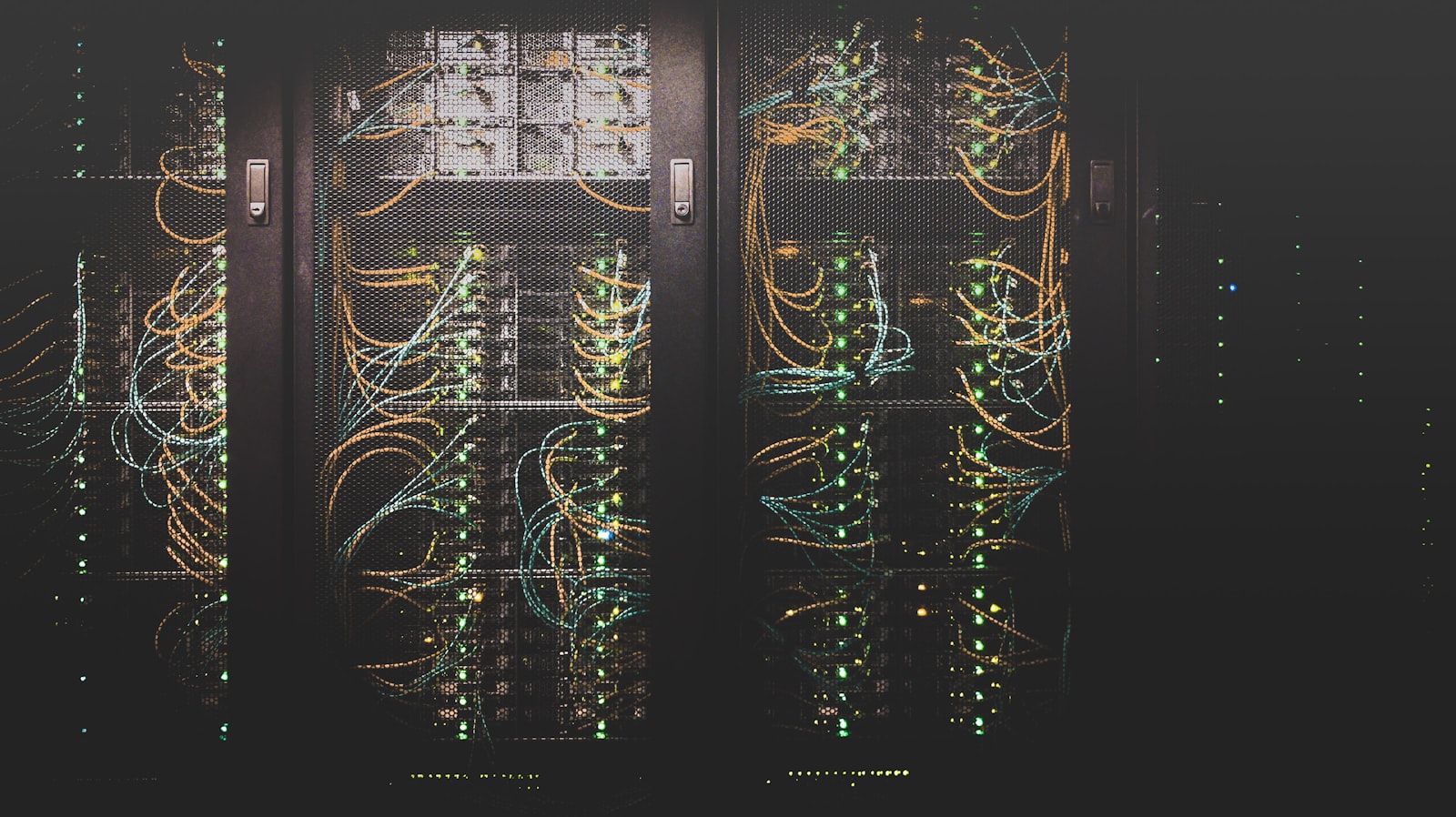 Structured network cabling in an on-premises data center, representing a reusable platform layer that consultancies deploy across regulated client engagements