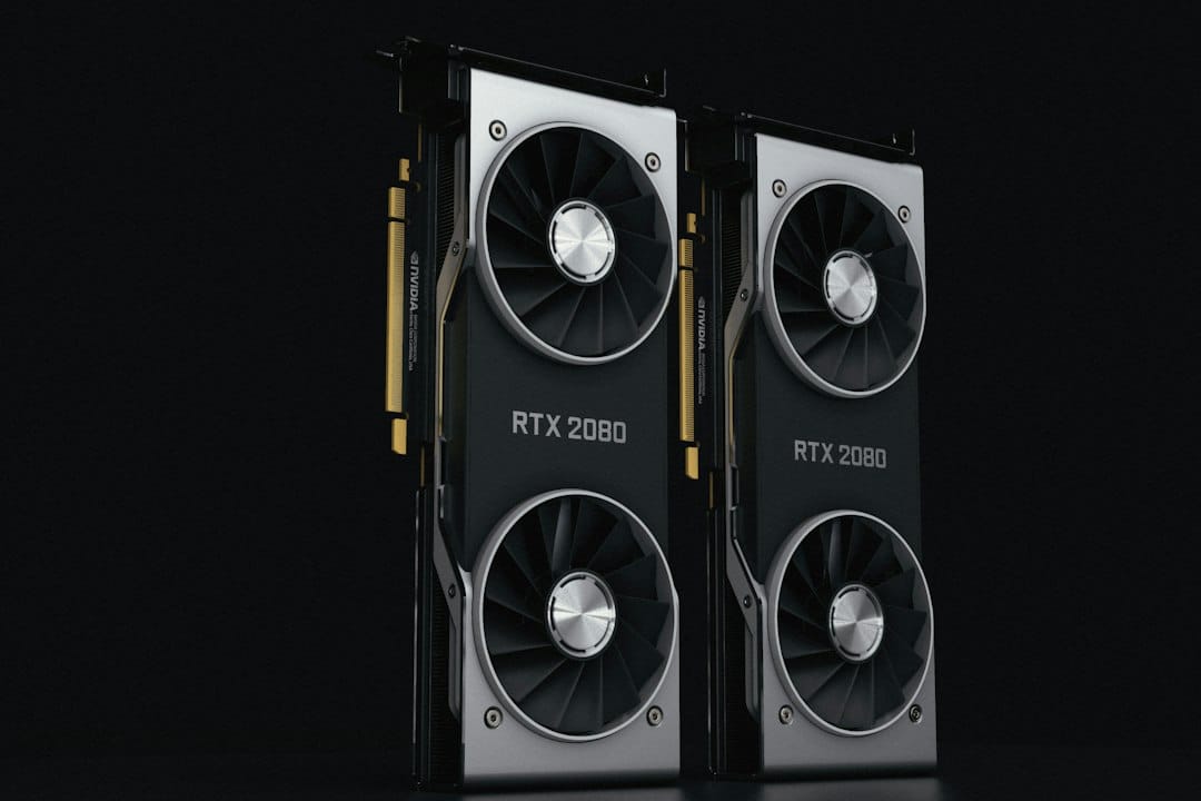 Two graphics cards standing upright side by side against a black background, a fitting picture for a head-to-head comparison of the servers that run language models on GPUs