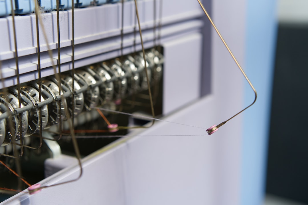 Close-up of industrial machinery with data cables — representing on-premise AI infrastructure deployed in manufacturing and industrial environments for secure, sovereign compute